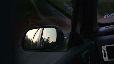 Sunset in rearview mirror Stock Footage 52686883