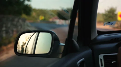 Sunset in rearview mirror 스톡 동영상 52687390