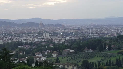 Sunset with red lights on Florence from the surrounding hills Stock Footage 140842038