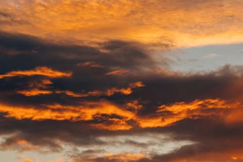 Sunset Red Orange Dark dramatic Colourful Clouds Stock Photos