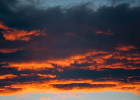 Sunset Red Orange Dark dramatic Colourful Clouds Stock Photos