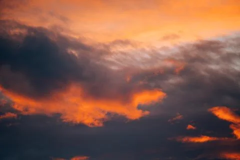 Sunset Red Orange Dark dramatic Colourful Clouds Stock Photos
