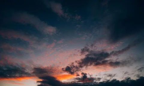 Sunset Red Orange Dark dramatic Colourful Clouds Stock Photos