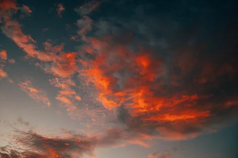 Sunset Red Orange Dark dramatic Colourful Clouds Stock Photos
