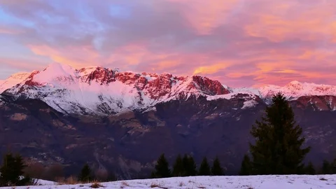 Sunset red reflection on mountain range - pan left Stock Footage 83945520
