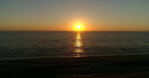 Sunset Red Sky Beach Moving Forward, Noordwijk, Netherlands / Holland (4K Drone) Stock Footage 114708910