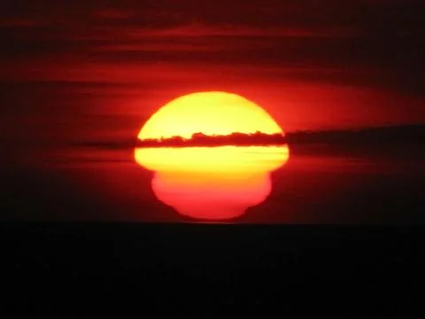 Sunset with red sky Stock Photos