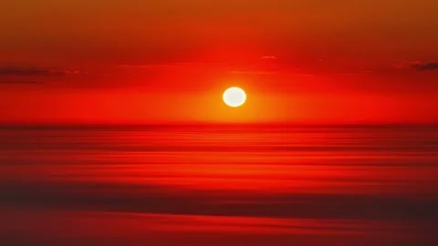 Sunset with Red Sun Over Hazy Sky and Clean Gradient Stock Footage 317746087