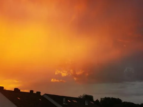 Sunset with reddish and blue clouds in central Europe Stock Photos