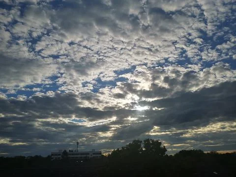 Sunset with reddish and blue clouds in central Europe Stock Photos
