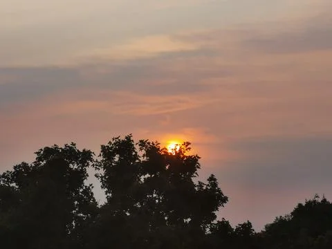 Sunset with reddish and blue clouds in central Europe Stock Photos