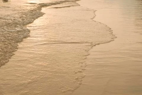 Sunset reflec on the beach Stock Photos