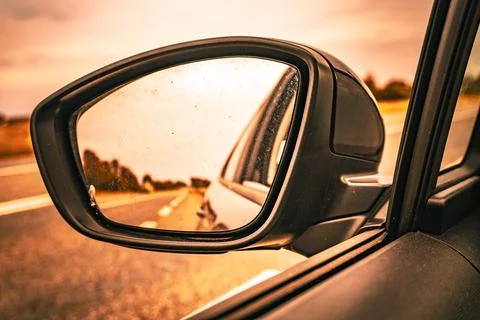 Sunset Reflected in Car Side Mirror Stock Photos