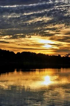 Sunset is reflected in the lake. Germany Foto stock