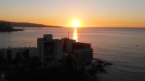 Sunset is reflected in Pacific ocean (Vina del Mar, Chile) aerial view 動画素材 119816731