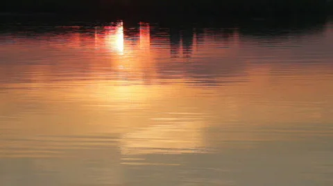 Sunset reflected in the river Stock Footage 732378