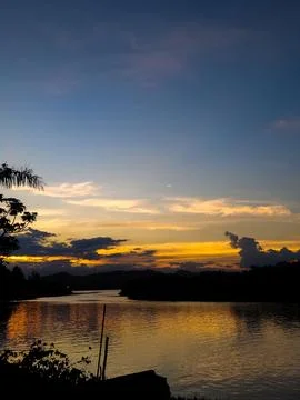 Sunset reflected on the river Stock Photos