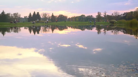 Sunset Reflected in the Water of the Lake Stock Footage 68107804