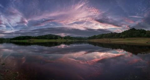 Sunset reflected in the water Stock Photos