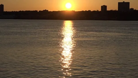 Sunset reflecting on Hudson Video stock 98843429