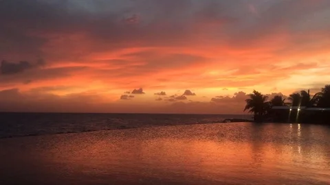 Sunset Reflecting Over Pool &amp; Ocean In Curacao Stock Footage 116655581