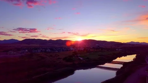 Sunset reflecting off the river Stock Footage 113534306