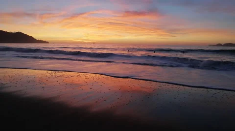Sunset Reflecting in waves in California 스톡 동영상 57925072