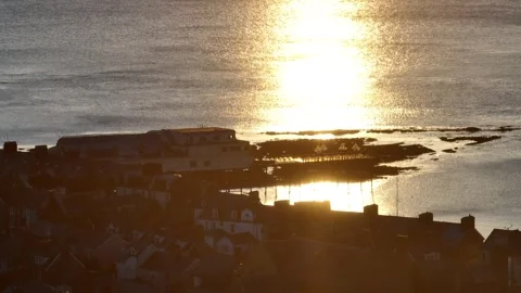 Sunset reflection on Aberystwyth pier Stock Footage 264845677