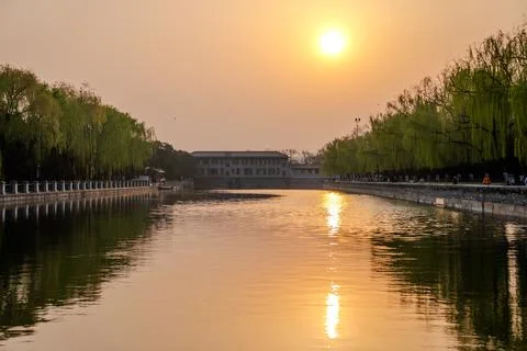 Sunset reflection along canal in central Beijing Stock Photos
