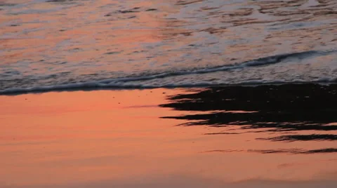 Sunset reflection on the beach Video stock 37345750