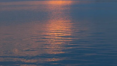Sunset reflection on blue water surface, waves, Stock-Footage 91828804