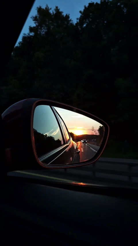 Sunset Reflection in Car Side Mirror During Highway Road Trip Stock Footage 337481697