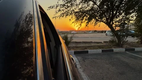 Sunset Reflection On Car Window Frame Stock Footage 334416157