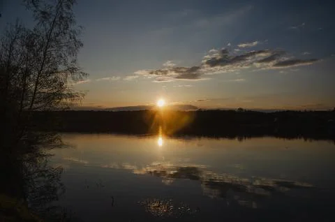 Sunset with reflection in the lake Stock Photos