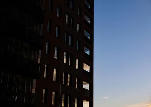 Sunset reflection on modern building windows blue Stock Photos