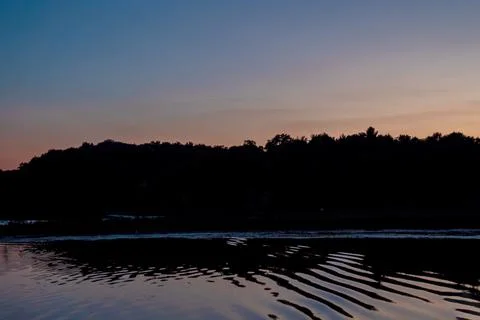 Sunset Reflection Over Lake and Forest Фото