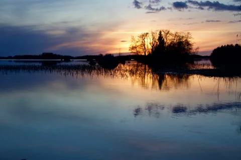 Sunset with reflection. Stock Photos