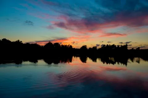 Sunset Reflection on a Pond Stock Photos