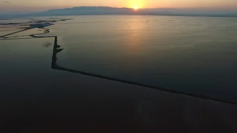 Sunset reflection in the rice fields of Ebro Delta estuary Spain, Catalonia 스톡 동영상 95292443