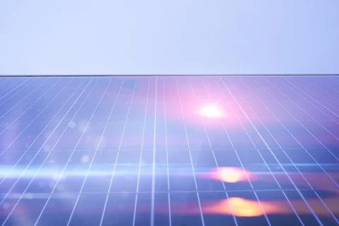 Sunset reflection in solar panels Stock Photos