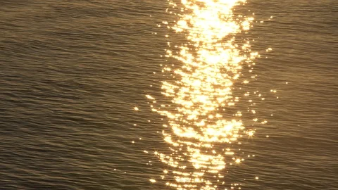 Sunset reflection sparkles on tiny ripples of sea water wave 스톡 동영상 100694885
