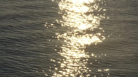 Sunset reflection sparkles on tiny ripples of sea water wave 스톡 동영상 109084692