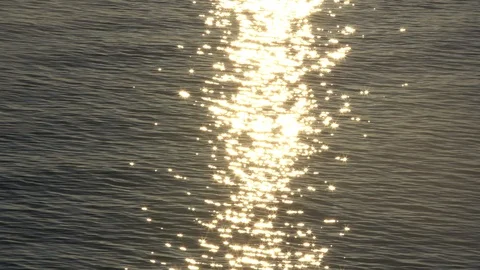 Sunset reflection sparkles on tiny ripples of sea water wave 스톡 동영상 109448999