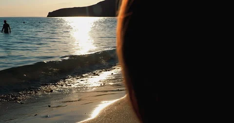 Sunset reflection on a summer beach Stock Footage 248775861
