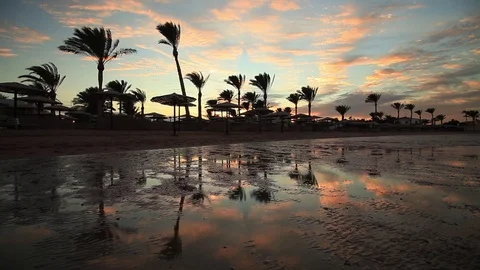 Sunset reflection in the water on the beach. Egypt 库存影片 71760952