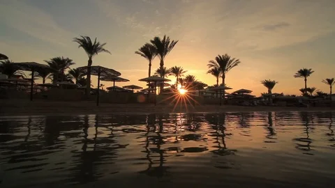Sunset reflection in the water on the beach. Egypt 库存影片 71762233