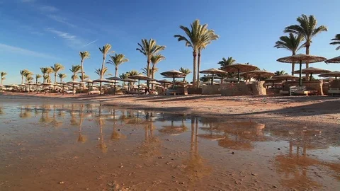 Sunset reflection in the water on the beach. Egypt Stock Footage 72272581