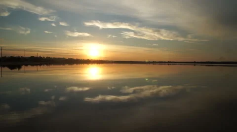Sunset with reflection in water Video stock 55302288
