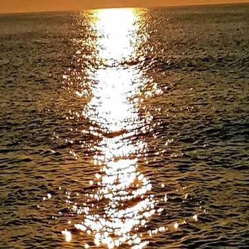 Sunset with reflection on water Stock Photos