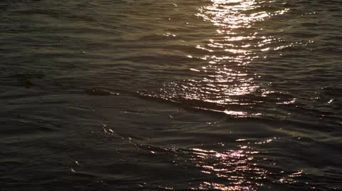 Sunset reflection in water slow motion Stock-Footage 12657104